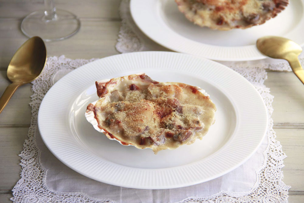 Vieiras gratinadas con champiñones